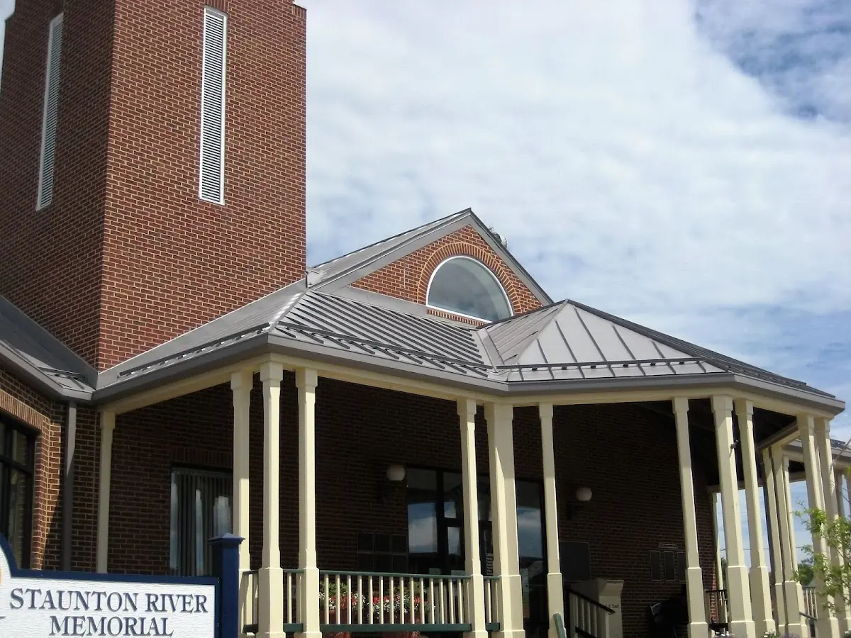 Skilled roofing craftsmen working on a residential roof in Downtown Englewood